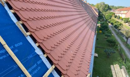 Dach kamienicy przy ulicy Traugutta