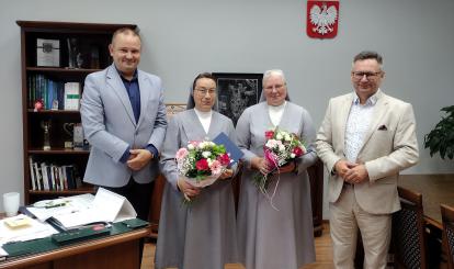 Pamiątkowe zdjęcie ze spotkania w Ratuszu