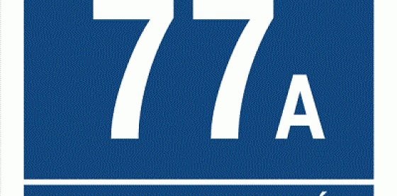 Tabliczka na terenie wiejskim bez nazw ulic